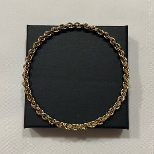 Gold tone bangle bracelet